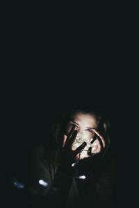 Portrait of man smoking at home