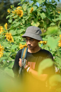 Young man looking away outdoors