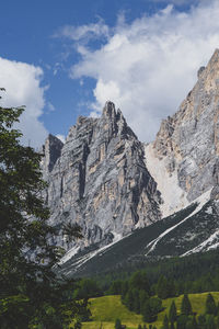 Low angle view of mountain range against sky