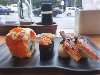 Close-up of sushi served on table