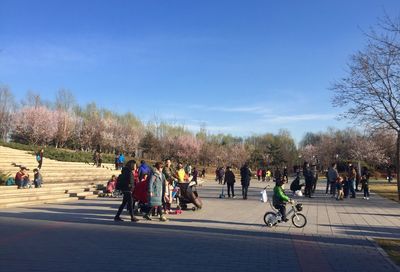 People on road against sky