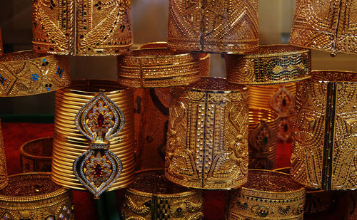 Gold bangles for sale at market stall