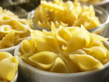 Close-up of pasta in bowls on table