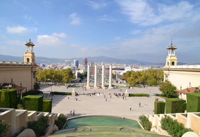 Buildings in city against sky