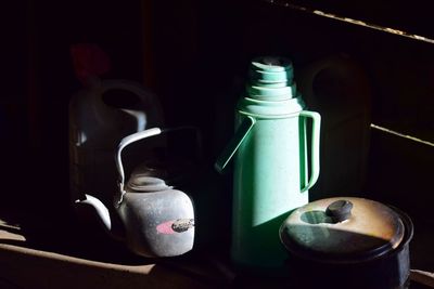 Close-up of containers on table