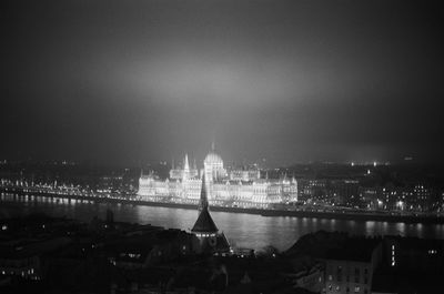 Illuminated cityscape at night