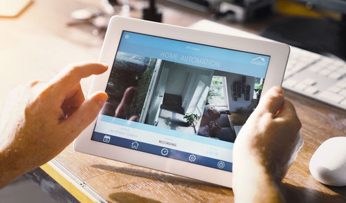 Close-up of man using mobile phone