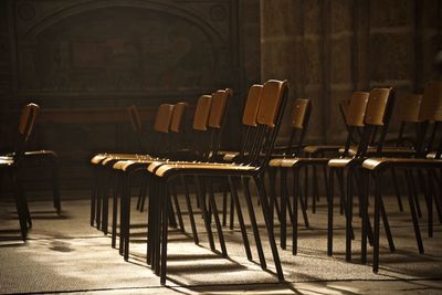 Empty chairs in room church