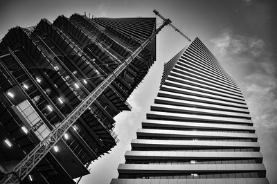 Low angle view of modern buildings against sky