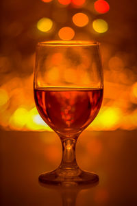 Close-up of wineglass on table