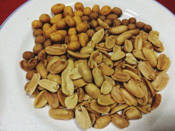 Close-up of roasted coffee in bowl on table