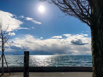 Scenic view of sea against sky on sunny day