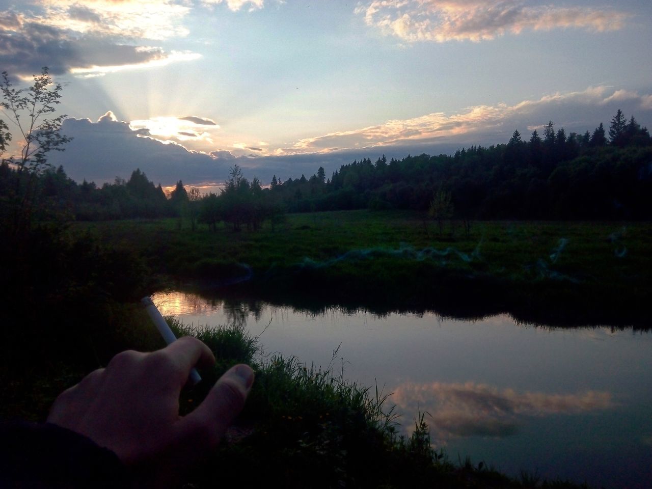 SCENIC VIEW OF SUNSET OVER MOUNTAINS