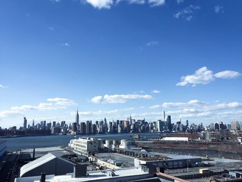Cityscape against blue sky