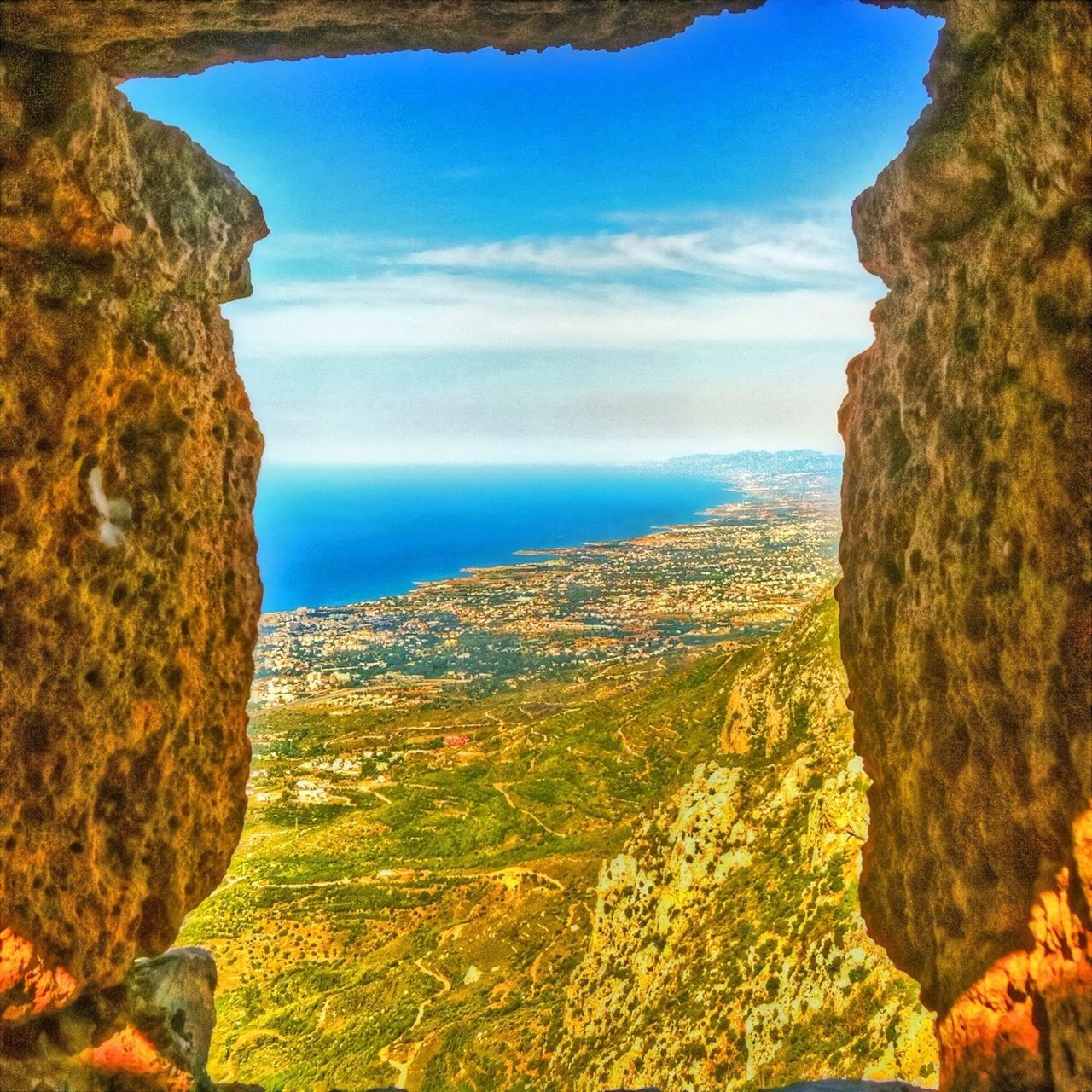 sea, tranquility, tranquil scene, horizon over water, scenics, rock formation, sky, beauty in nature, rock - object, nature, cliff, water, blue, rock, mountain, idyllic, geology, cloud, landscape, non-urban scene