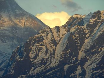 Scenic view of mountains against sky during sunset