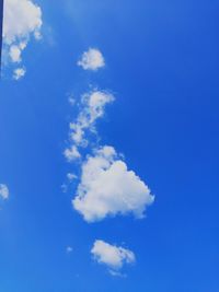 Low angle view of clouds in blue sky