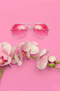 Eyewear accessory concept. stylish pink sunglasses