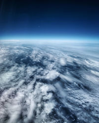 Aerial view of cloudscape against blue sky