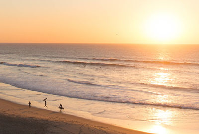 Scenic view of beach during sunset