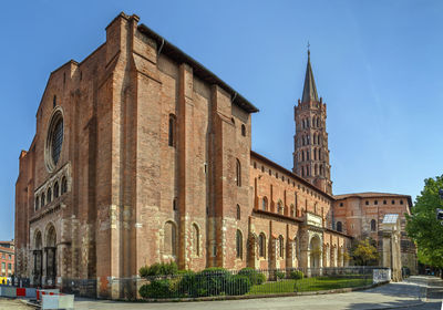 Exterior of old building against sky in city