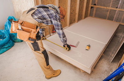 Low section of man working at home