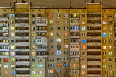 Full frame shot of illuminated apartment building