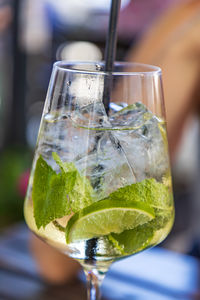 Close-up of hand holding wineglass