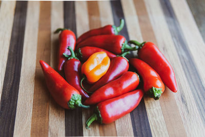 High angle view of chili peppers on table