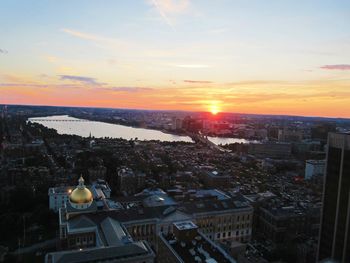 High angle view of city at sunset