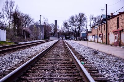 Surface level of railroad tracks against buildings