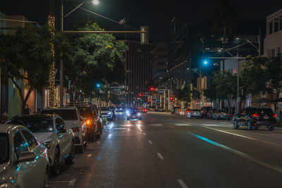 Cars on road at night