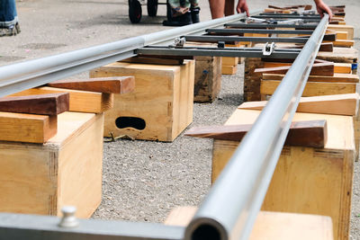 High angle view of metal railing on table