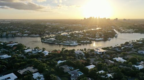 High angle view of river amidst buildings in city