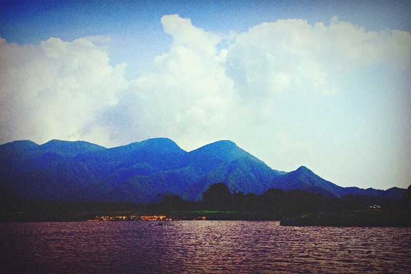 mountain, mountain range, water, tranquil scene, scenics, tranquility, waterfront, sky, beauty in nature, lake, nature, cloud - sky, idyllic, river, silhouette, dusk, cloud, outdoors, landscape, non-urban scene