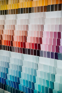 Color swatches on wall in hardware store