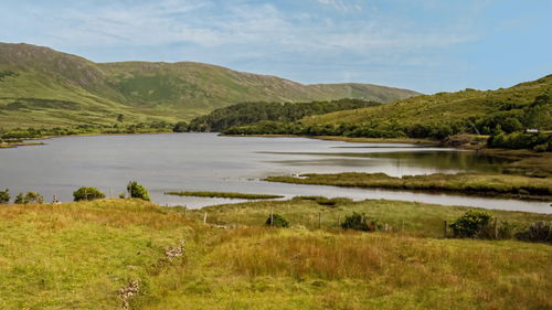 Scenic view of lake and mountains against sky in connemara national park