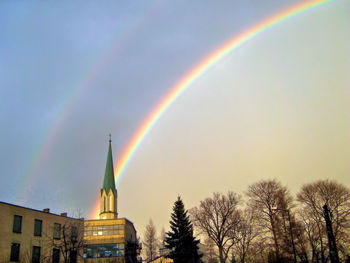 Low angle view of rainbow against sky