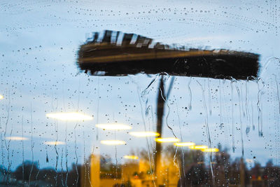 Close-up of wet glass window in rainy season