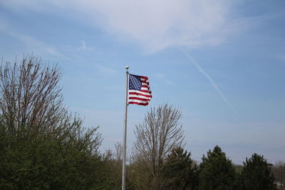 Low angle view of flag against sky