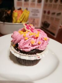 Close-up of cupcakes on table