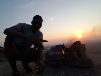 Silhouette of people at sunset