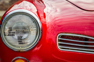 Close-up of red vintage car