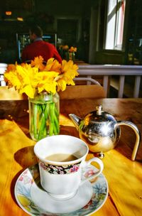 Close-up of flower vase on table