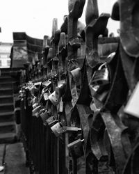Close-up of padlocks hanging in row