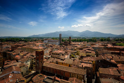 High angle view of buildings in city against sky