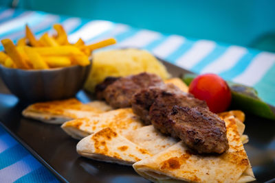 Close-up of food served on table