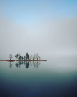 Scenic view of lake in a fog