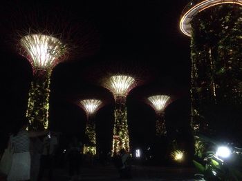 Low angle view of illuminated building at night