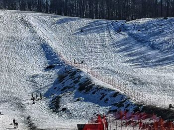 Scenic view of snowcapped mountains during winter
